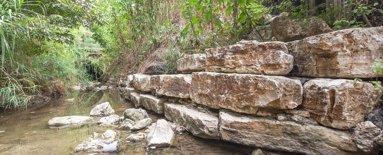 Blunn Creek channel with rock wall